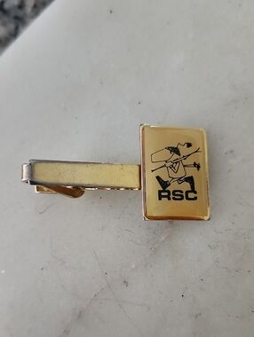 Vtg Gold Tone Men's Tie Clip With RSC Man Holding Skis Logo